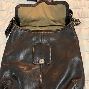 Black coach leather handbag.